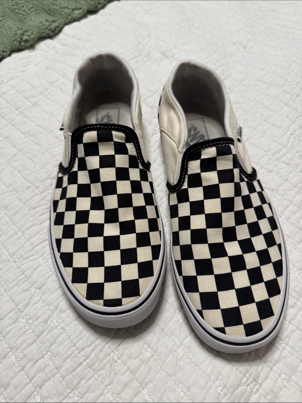Vans Slip-On Checkerboard Canvas Sneakers in Black and White